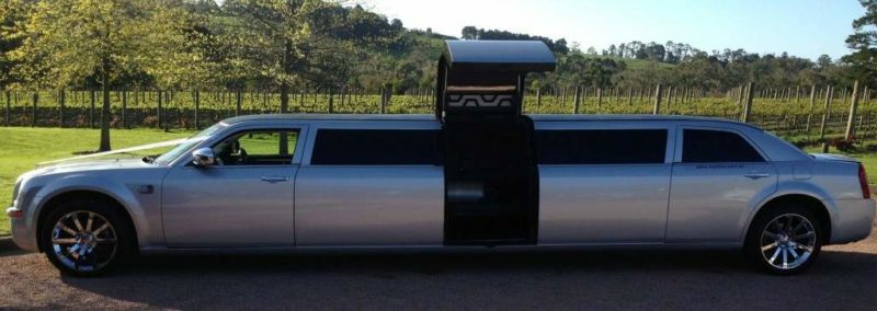 1024 x 363 Limo hire Melbourne - MyLimo - Black and silver super stretch - jet door
